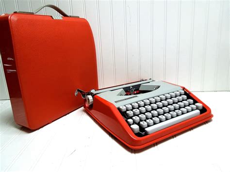 orange hermes rocket typewriter